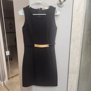 Size small beautiful black dress with gold belt